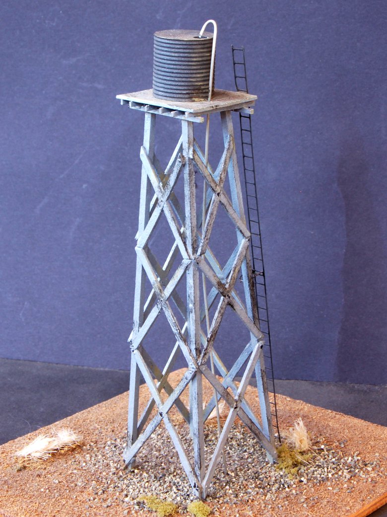 Corrugated iron water tank on high tower